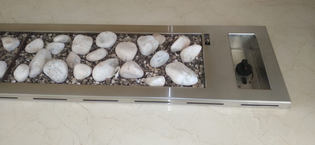 Modern stainless steel pebble gas fireplace insert installation